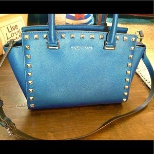 Rich deep navy and chrome studded crossbody purse